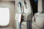 Blue Mo'Bettah Airplane Phone Holder holding an iPhone on an airplane seat pocket during a flight