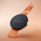 Back view of Orange Mo'Bettah Airplane Phone Holder for MagSafe-compatible iPhone