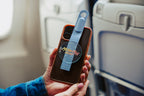 Purple Mo'Bettah Airplane Phone Holder attached to a MagSafe-compatible iPhone